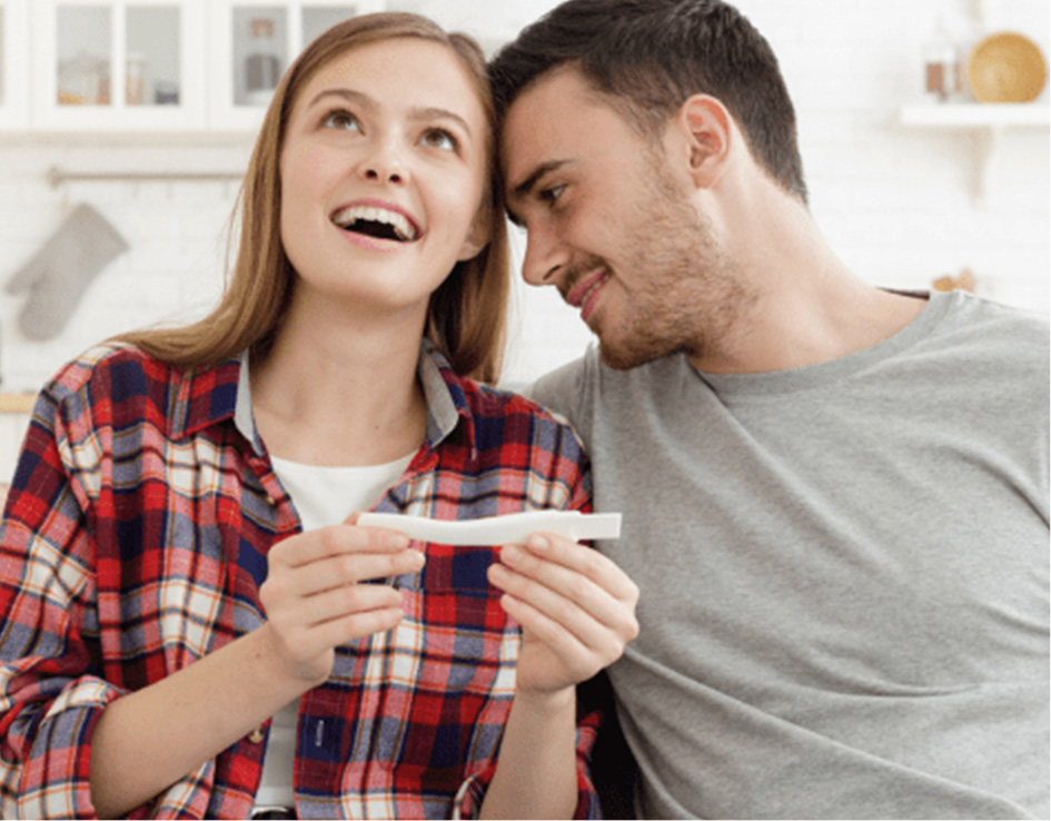 Happy Couple Checking Pregnancy Test