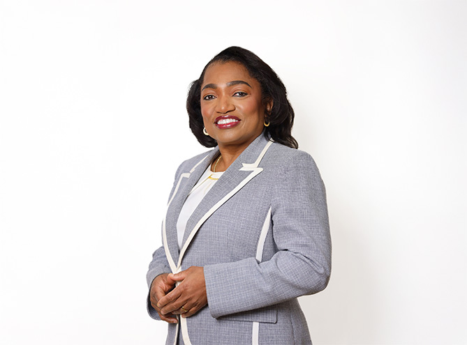 Woman wearing a formal attire smiling